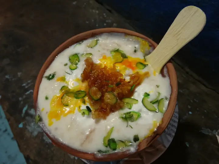 A kulhad of lassi topped with fruit at Blue Lassi in the old city